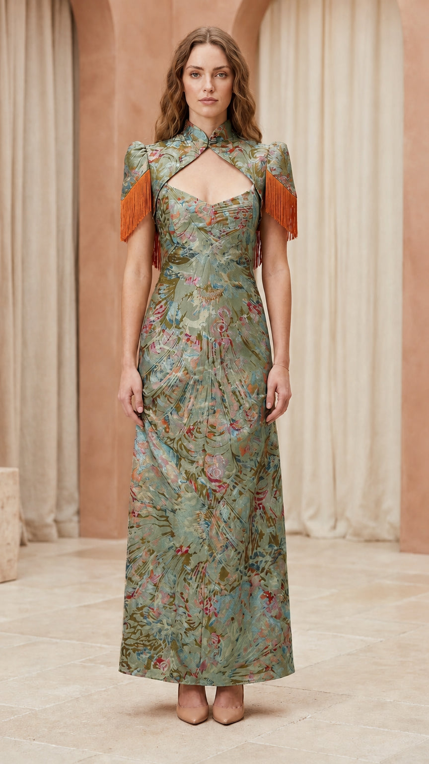 Front view of model wearing green floral brocade maxi dress