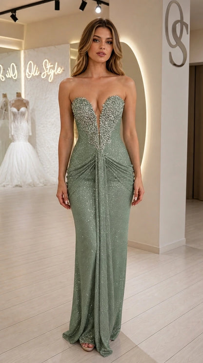 Front view of model wearing sage green strapless sequin evening dress