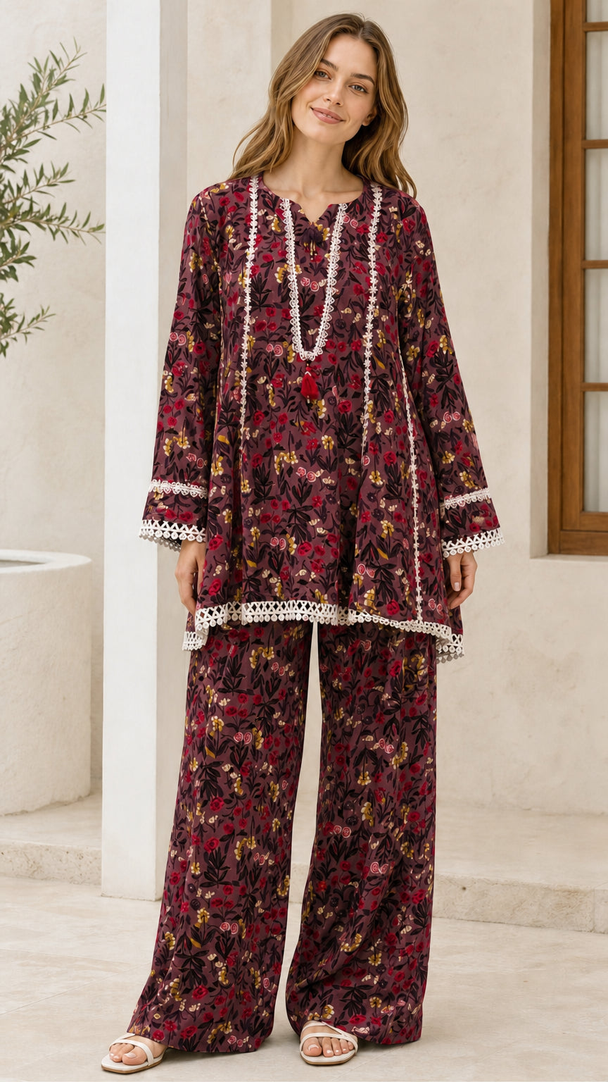 Model wearing burgundy floral two-piece set
