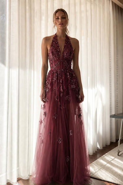Front view of burgundy embroidered halter evening dress