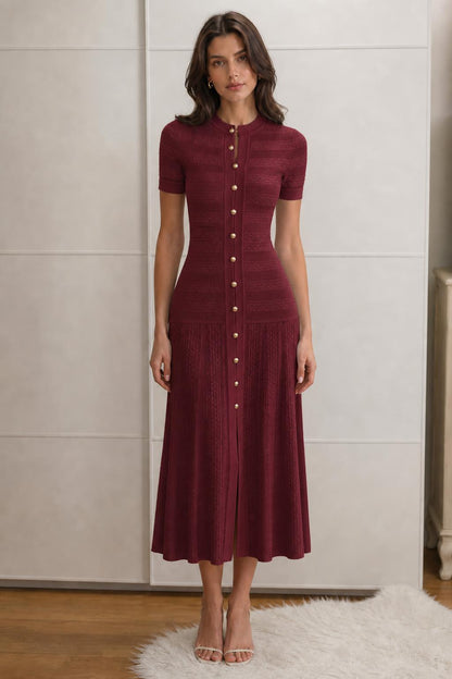 Front view of burgundy knit midi dress on model
