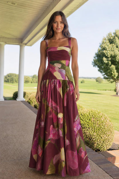 Front view of model wearing burgundy floral print maxi dress