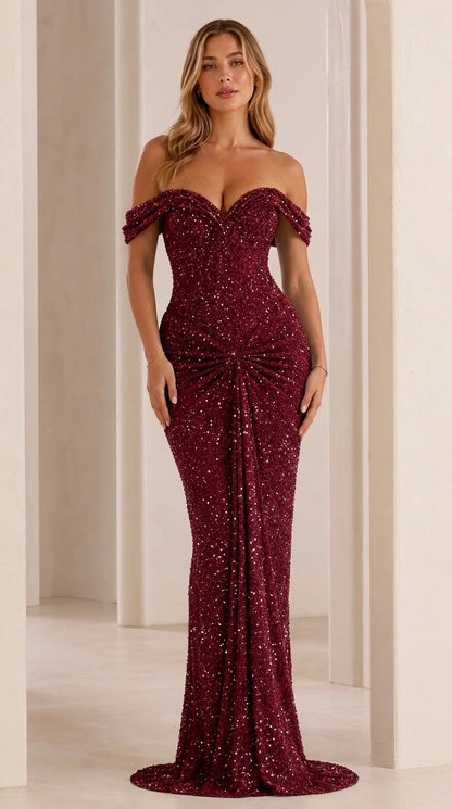 Model wearing burgundy off-shoulder sequin evening gown
