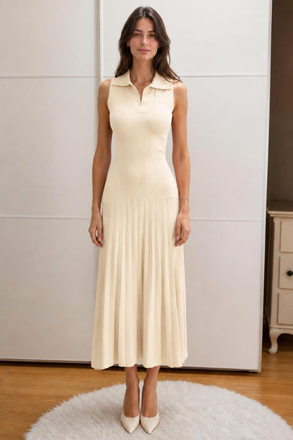 Front view of woman wearing beige sleeveless polo knit midi dress