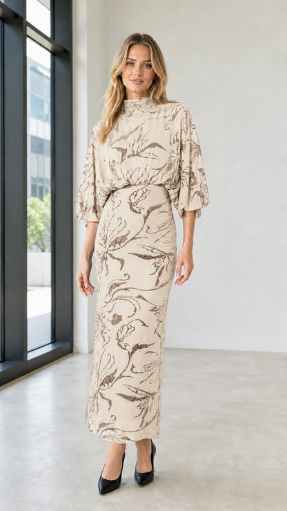 Front view of Champagne mock neck sequin floral maxi dress