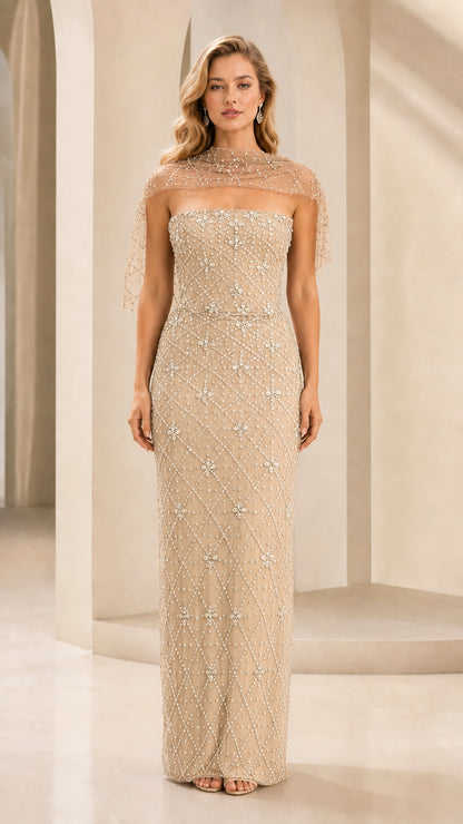 Front view of champagne beaded strapless evening gown