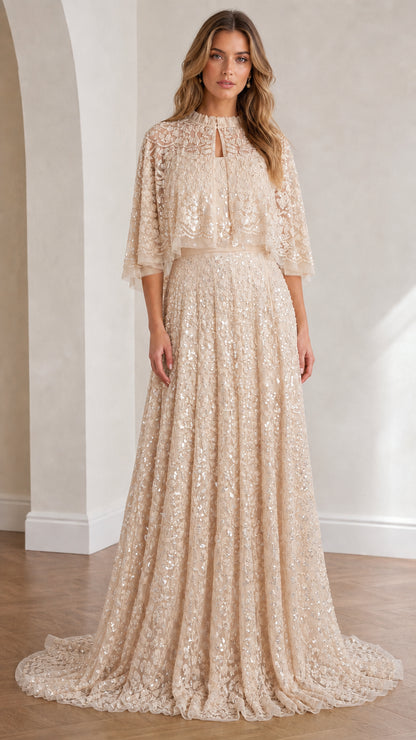 Full view of champagne sequin lace capelet evening gown