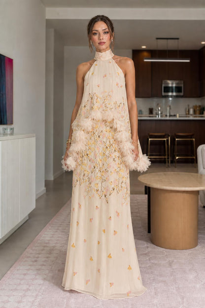 Front view of champagne floral halter maxi dress
