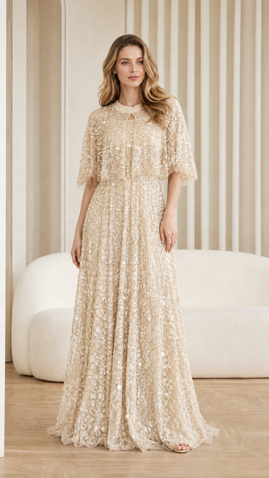 Front view of champagne sequin maxi dress