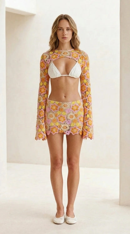 Front view of yellow floral crochet set