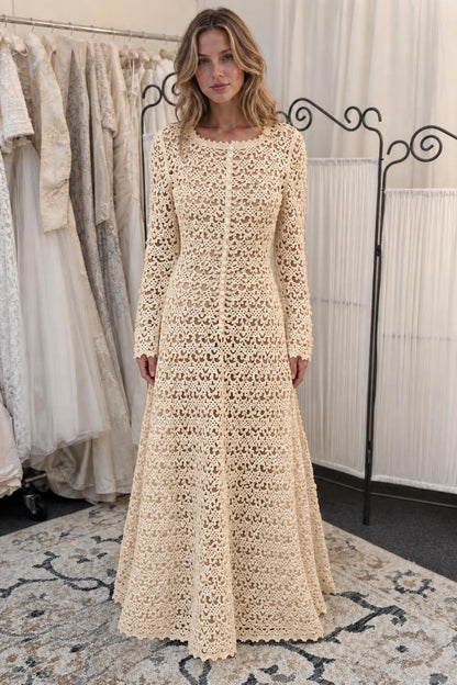 Woman wearing beige long-sleeve crochet lace maxi dress